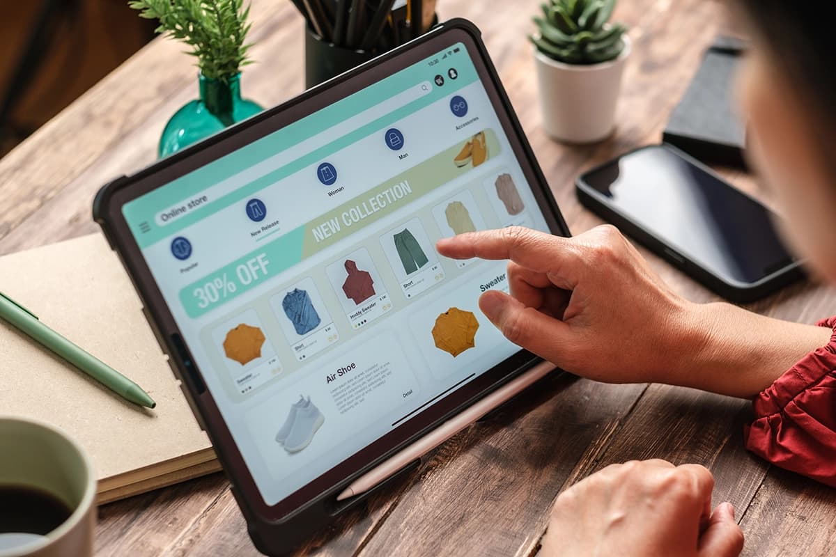 Close up of woman hand using credit card shopping online