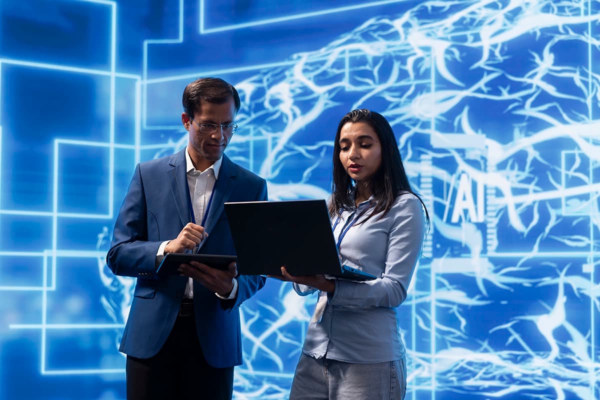 AI researchers collaborating on implementation methodology